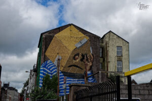 Fresque "What is home ?" by Asbestos, Centre, Cork, Irlande